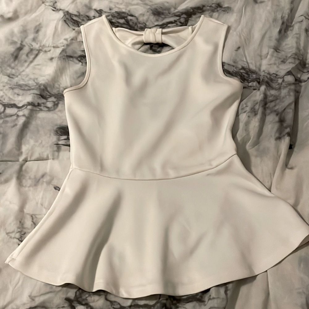 White peplum top